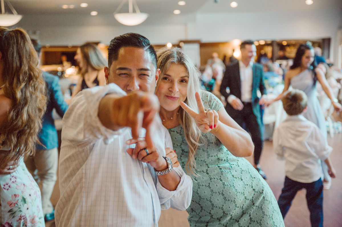 These two dancers, passionate lovers got married on a hot humid day at Auletto Caterers in Deptford NJ. Even though it was hot & humid Nina and Hector were all smiles as well as their family during the family portrait time. Wedding couple's and families that listens to you and does everything you ask them to even though the weather and environment can be tough are the BEST kind of clients! Nina and Hector were that best ideal clients, they from day one left all control regarding photo to me, did not question or have concerns. Knowing that you have this full trust and control on the wedding day makes you want to give your 100% and more. Nina and Hector are one of my top ideal clients and their wedding day photos are living proof of it. Nina and Hector's wedding day was combined of casual, mess, chaos, laughters, chill, emotional and passionate love for dancing. This was my first time at Auletto Caterers and in this part of NJ and this wedding venue in Deptford NJ was a pleasant surprise. It was full of secret locations for photos, garden, little pond where I played around with reflections, peacocks, waterfall and lavender field! Plus kind people to work with. Nina and Hector's July wedding at Auletto Caterers NJ captured by Karis from Hey Karis NY, NJ, Brooklyn, Hudson Valley and Catskills Wedding and Elopement Photographer.